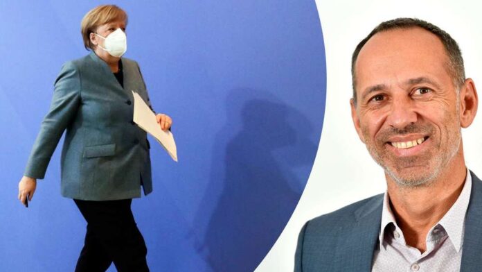 24966860-angela-merkel-verlaesst-die-pressekonferenz-zum-impfgipfel-daneben-kommentator-georg-anastasiadis-38iKwtrKjYNG