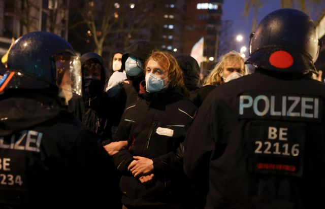 People protest against a decision by Germany's Constitutional Court, in Berlin