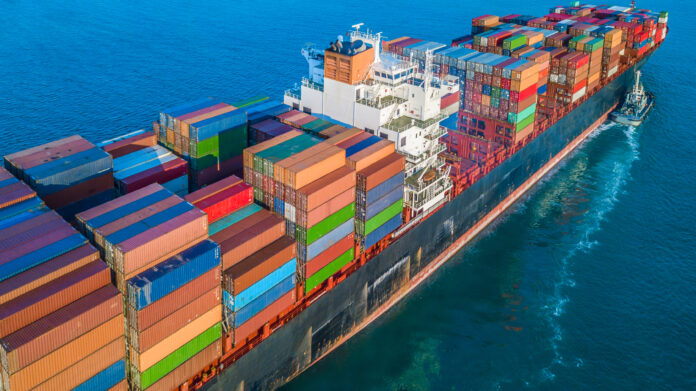 Cargo ship in import export and business logistic, Logistic and transportation of International Container Cargo ship in the open sea.
