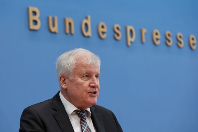 Germany's Interior Minister Seehofer attends news conference on migration, in Berlin