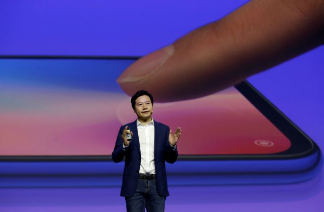 Xiaomi founder and CEO Lei Jun attends a launch ceremony of the new flagship phone Xiaomi Mi 9 in Beijing