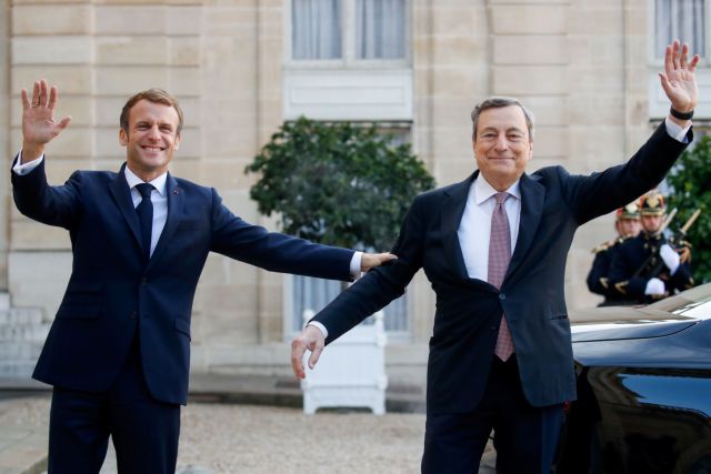 FILE PHOTO: French President Macron welcomes Italy's Prime Minister Draghi, in Paris